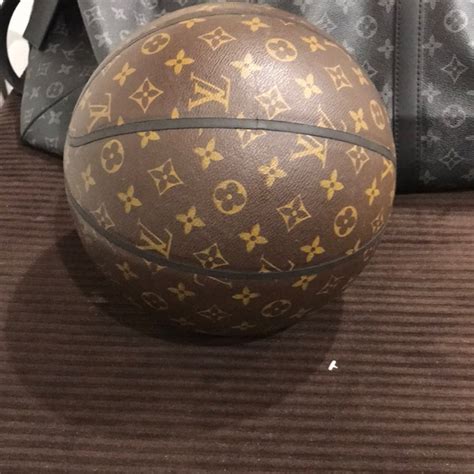 Louis Vuitton’s Gold Leather Basketball on display for the Paris 